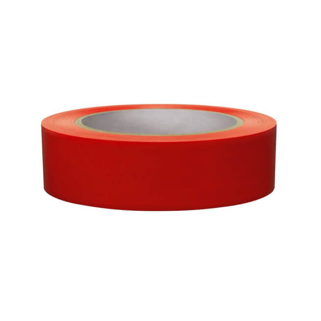 A roll of red adhesive tape.